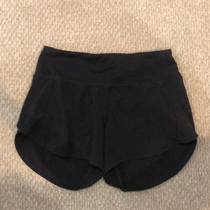 black Lululemon speedy up shorts 4 inch